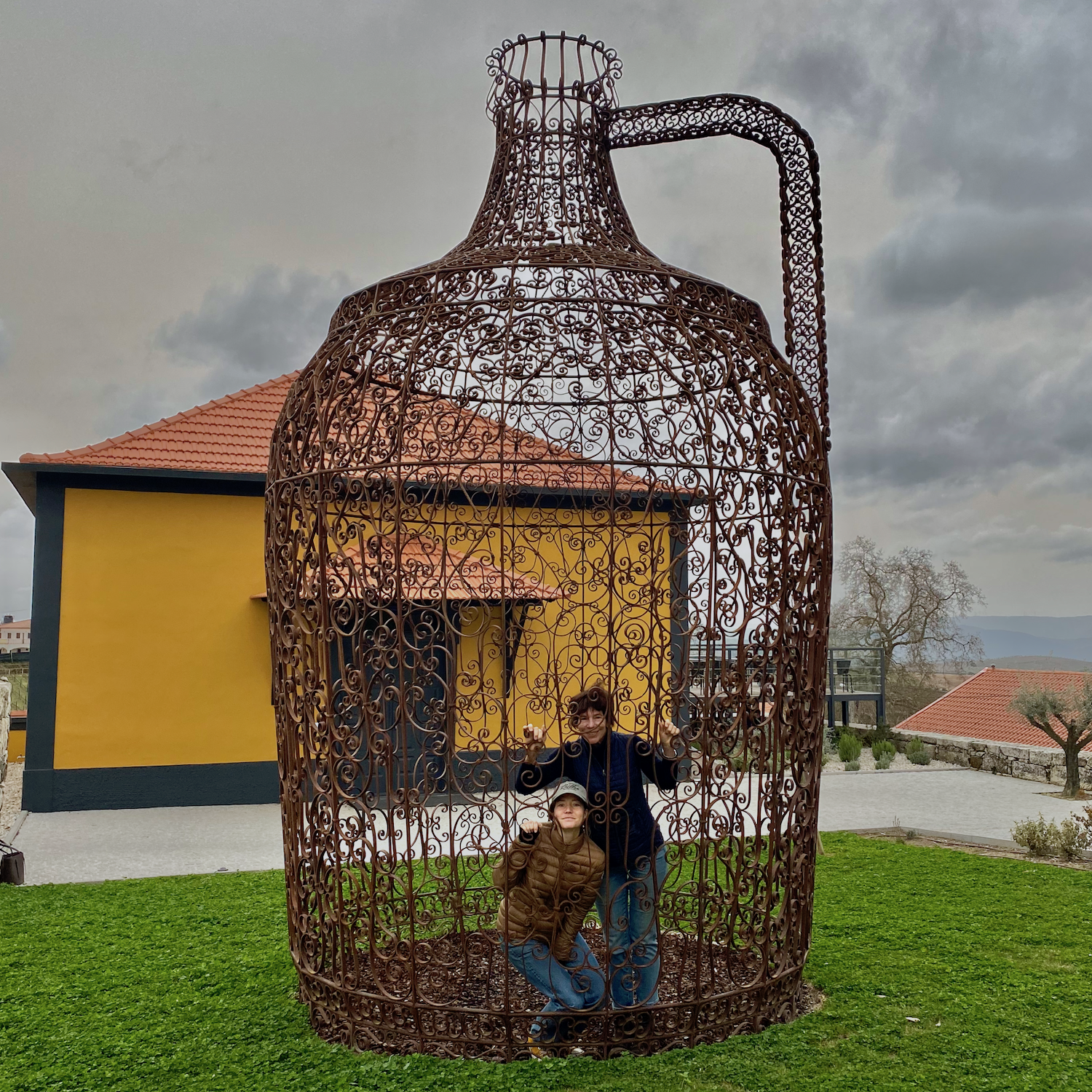 Towering "garrafa" inspired by Portugal's ornamental gates from the past.