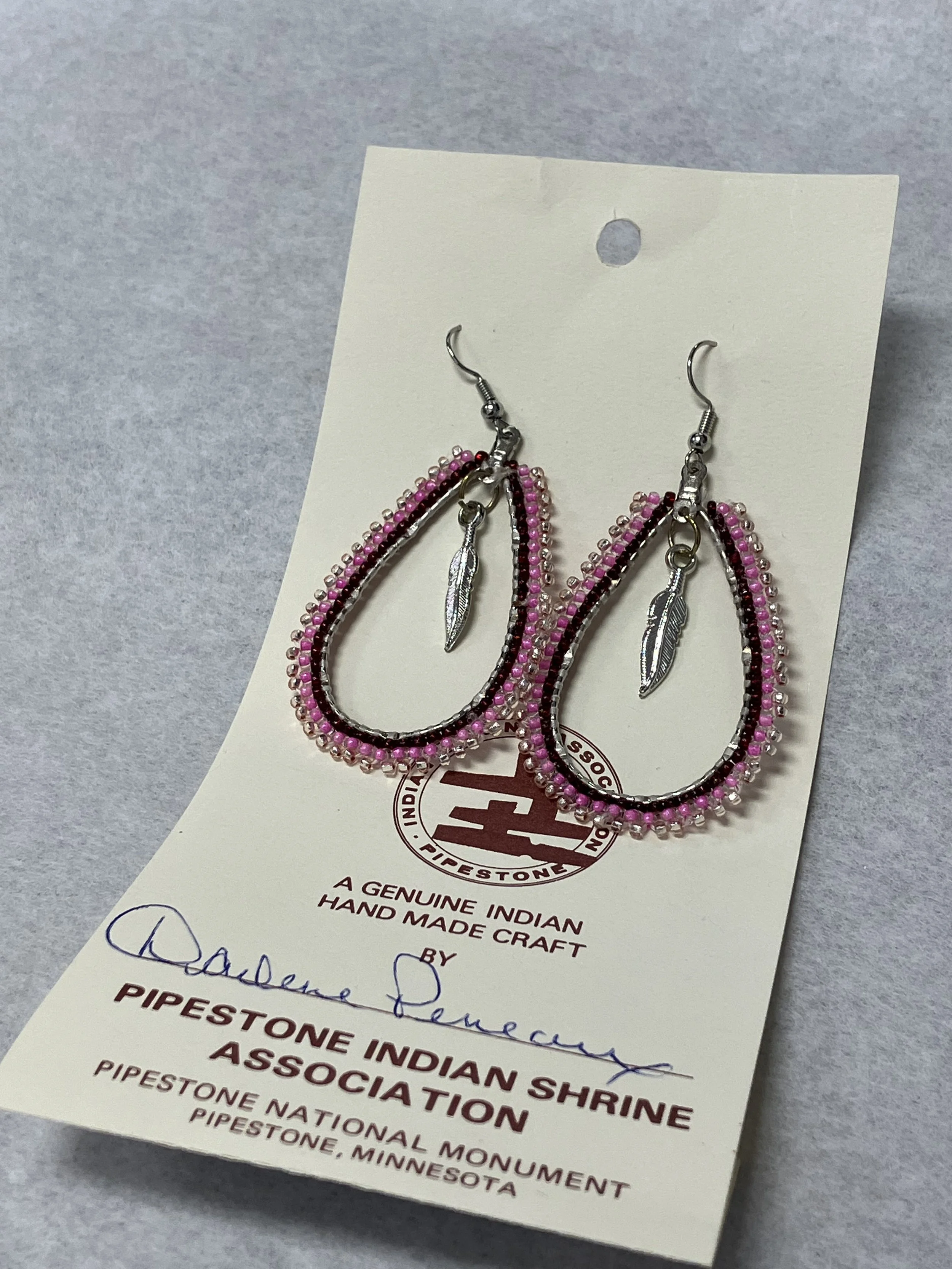 Hoop Beaded w Feather in middle 1-2.JPG