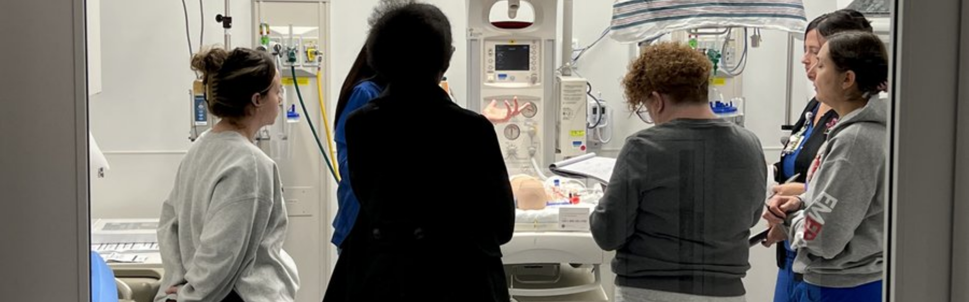 students in a simulation room