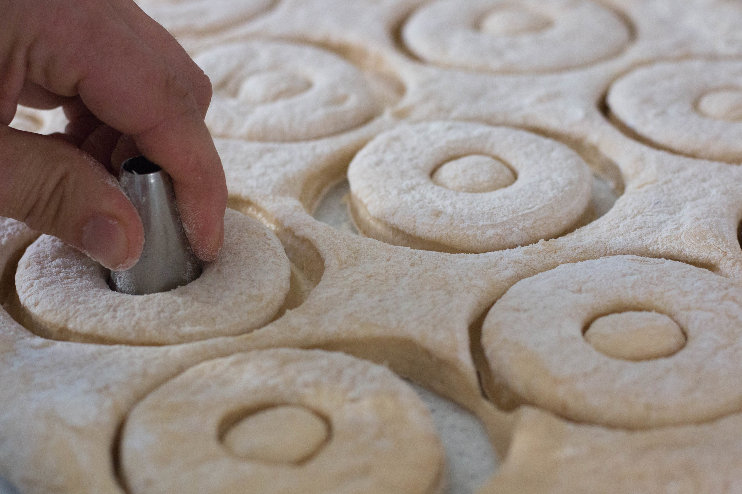 We were screwed last minute for a hole puncher so we used the back of a pastry tip and it worked great!