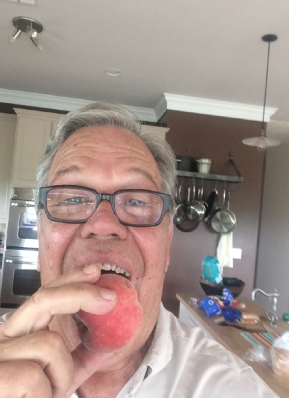 Jolie Vue Farms - Glen Boudreaux loves his peaches.