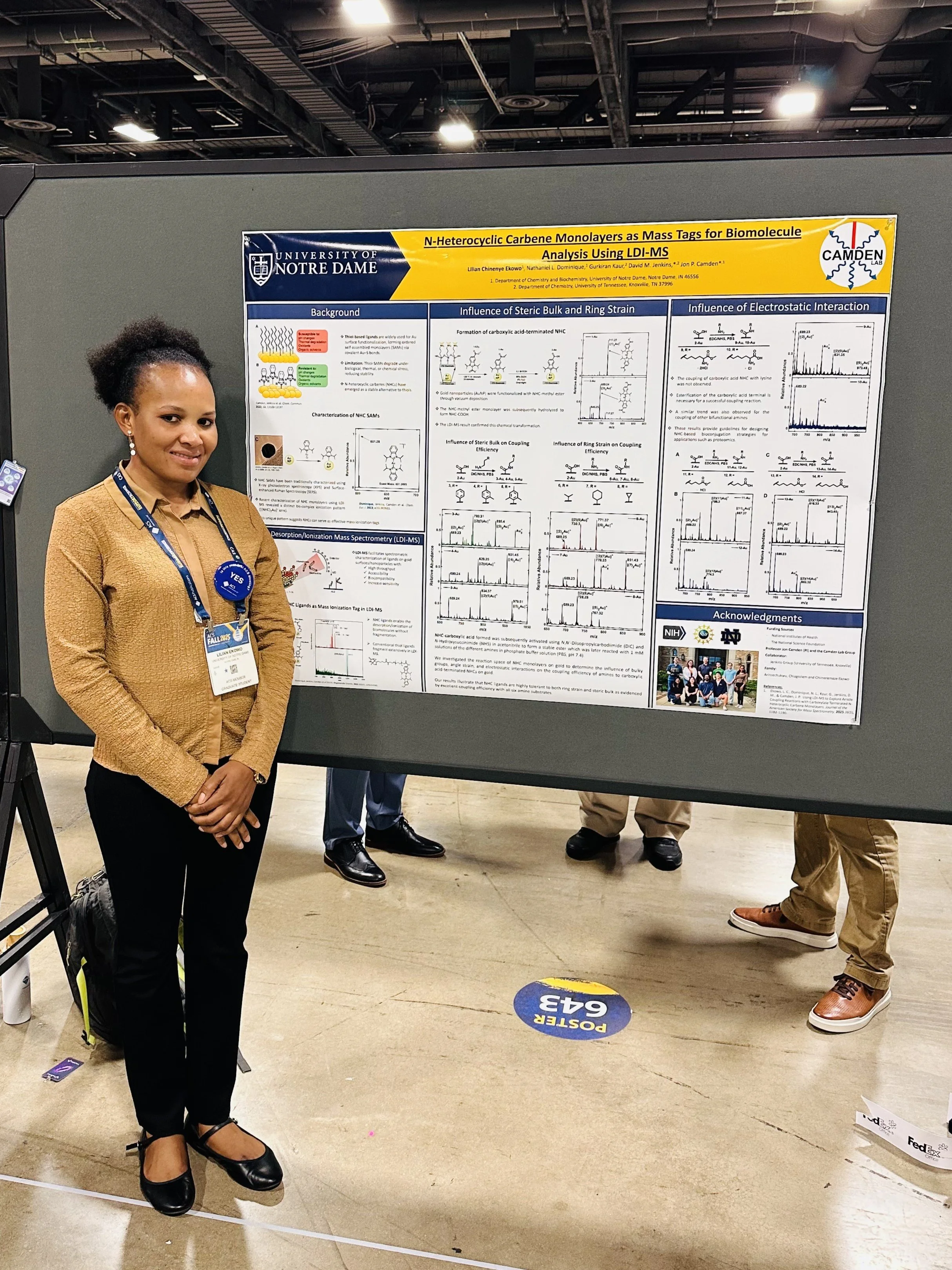 Lilian presenting her poster at the Fundamental Research in Colloids, Surfaces and Nanomaterials symposium