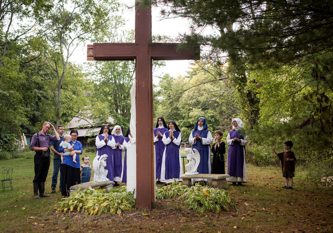  After community dinner and before they all say good-bye, they pray to Mother Mary at Children of Mary in Newark, Ohio, on September 24, 2016. 
