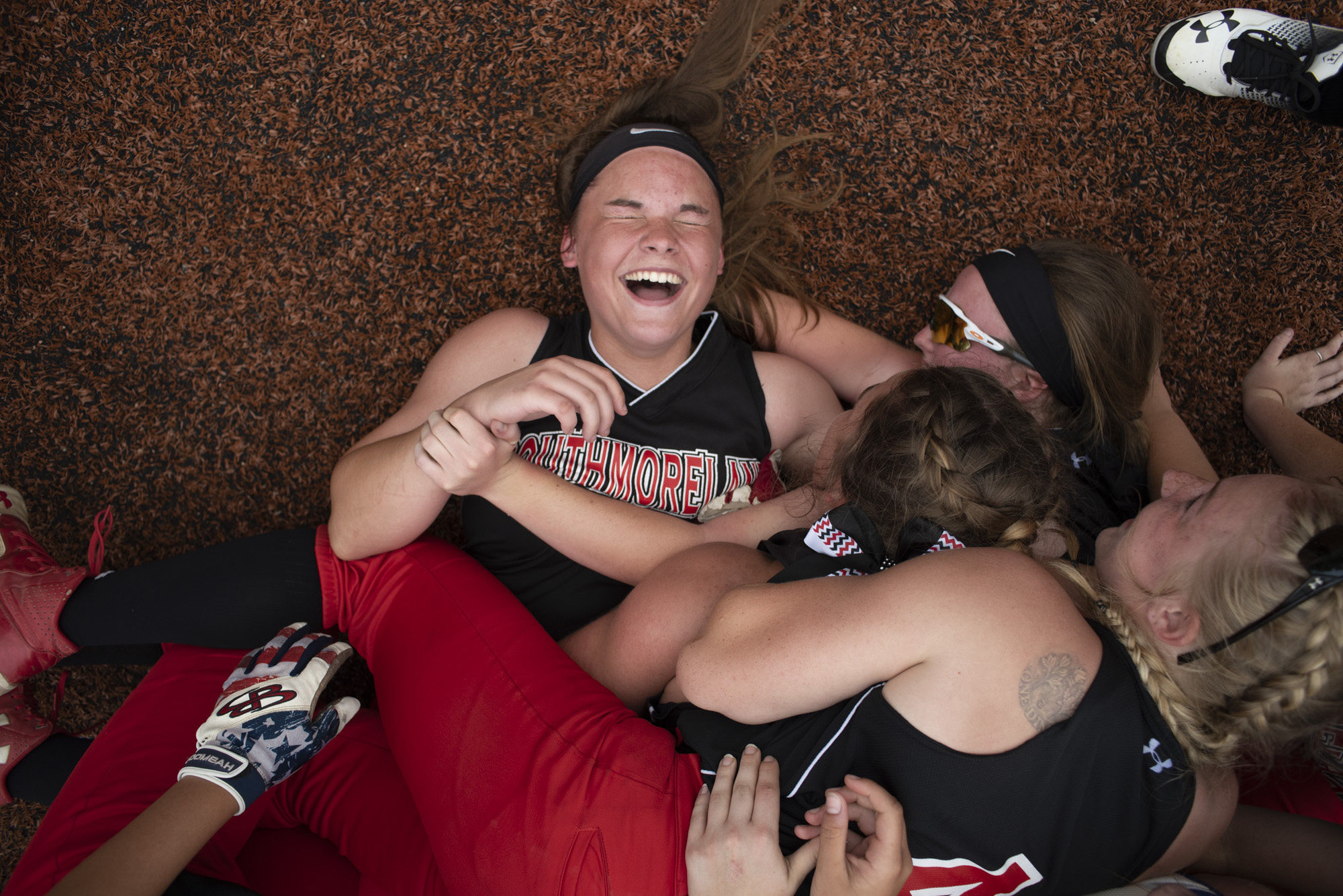 Southmoreland’s Varsity Softball team, dog piles on pitcher, Jess Matheny, after the WPIAL softball championship triple on Thursday, May 31, 2018.