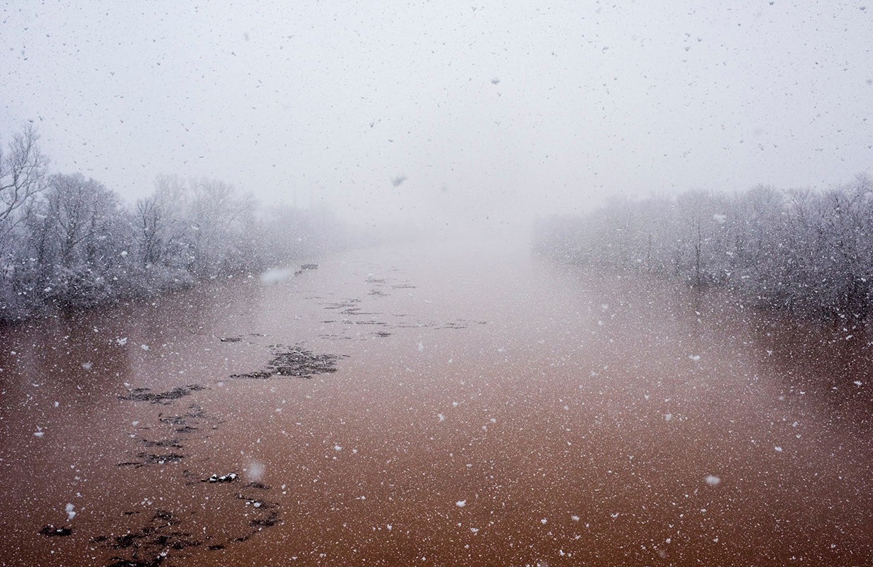 Snow falls on the Ohio River in Parkersburg West Virginia.