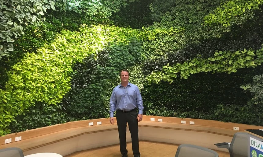 &nbsp;Mike Swords, at the LA Cleantech Incubator’s ‘living wall’. Photograph: Rory Carroll for the Guardian