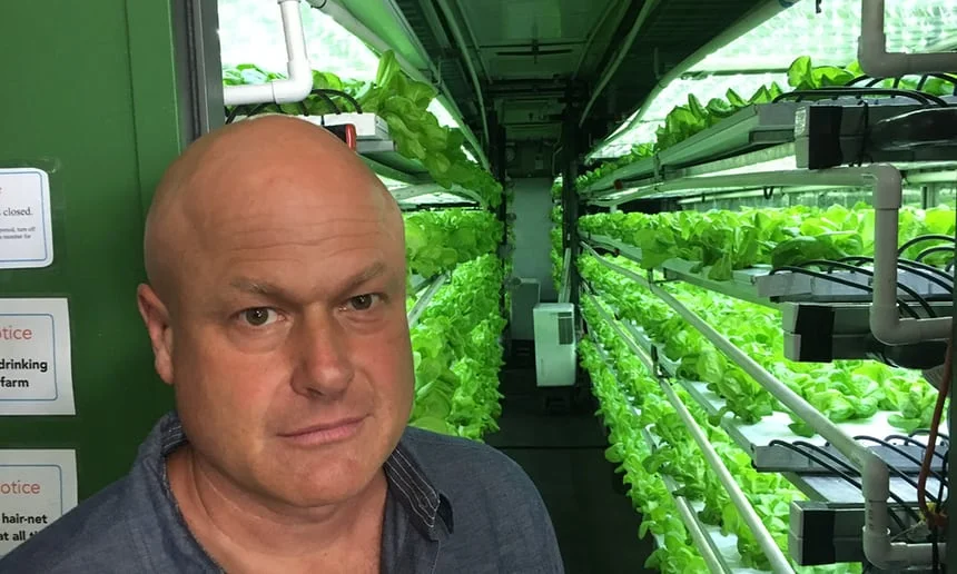 &nbsp;Kipp Stroden at the entrance to one of Local Roots’s container farms. Photograph: Rory Carroll for the Guardian