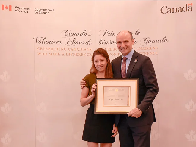 The Honourable Jean-Yves Duclos presents Lauren Rathmell, accepting on behalf of Lufa Farms Inc., with Canada’s Volunteer Award for Business Leader (Quebec)