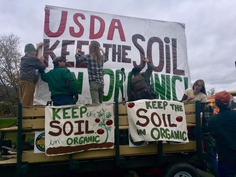 A rally in Thetford back in 2016 criticized the USDA's move to allow vegetables raised hydroponically to be labeled as "organic." Now a movement has formed to strengthen the organic label&nbsp; |&nbsp;&nbsp;REBECCA SANANES /&nbsp;VPR FILE