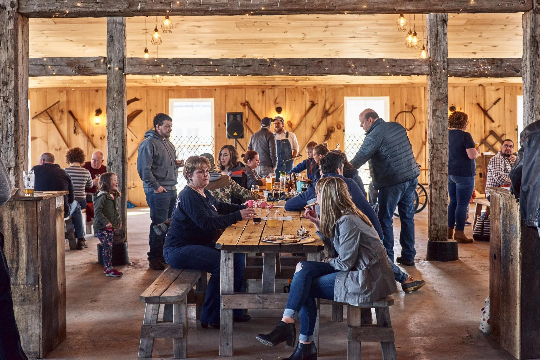 Customers of all ages are welcome at the main taproom at the Stone Cow Brewery.Credit Tony Luong for The New York Times