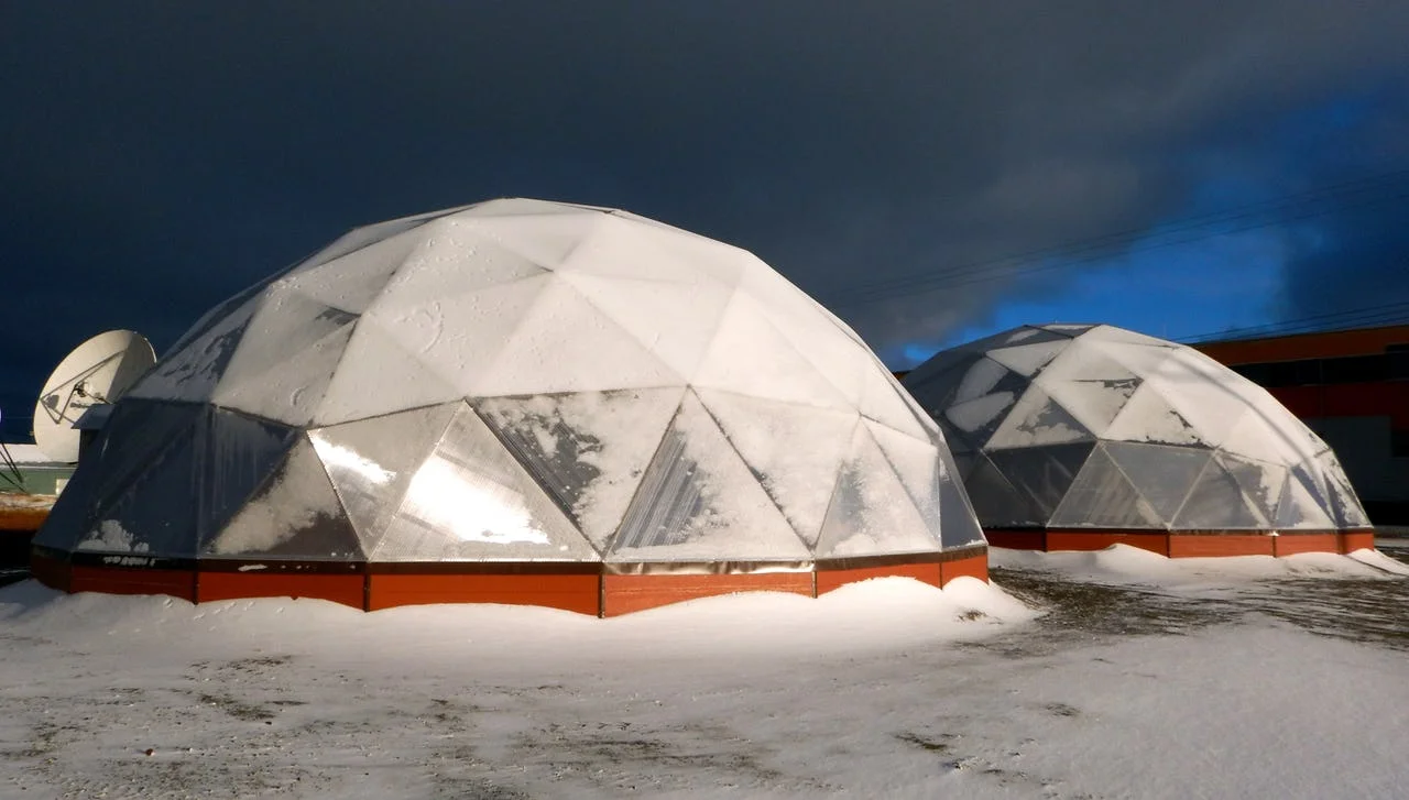 Green Iglus , solar retention greenhouses in Nunavut, aim at producing greenery and produce for the community. Photo: Mike Beauregard