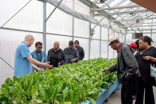 Members of a Gary church visits the Teen Challenge ECSIA greenhouse in Elkhart. (Photo: Photo provided)