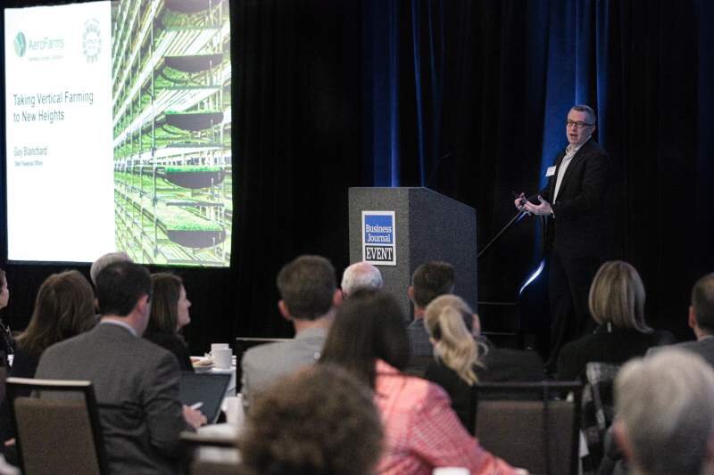 Guy Blanchard, chief financial officer of AeroFarms, explains how the New Jersey-based startup gets dozens of turns of fresh produce annually through its vertical indoor farm, speaking at North Bay Business Journal’s North Coast Specialty Food and B…