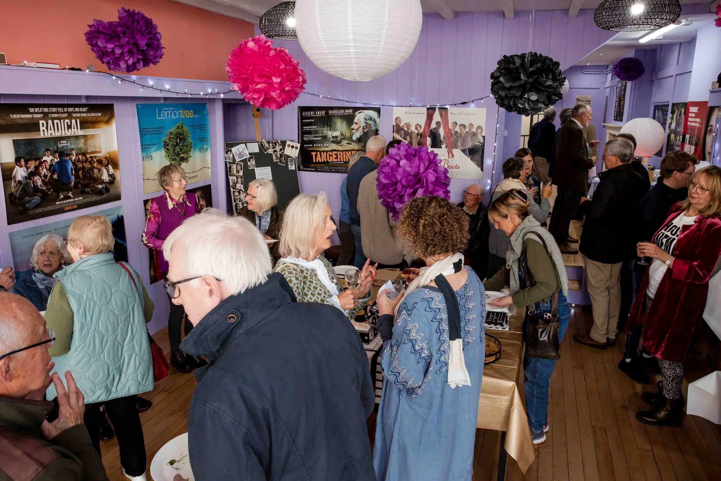 Overhead view of guests enjoying drinks, food and conversation at Berwick Film Society’s 21st birthday event at Jackal.