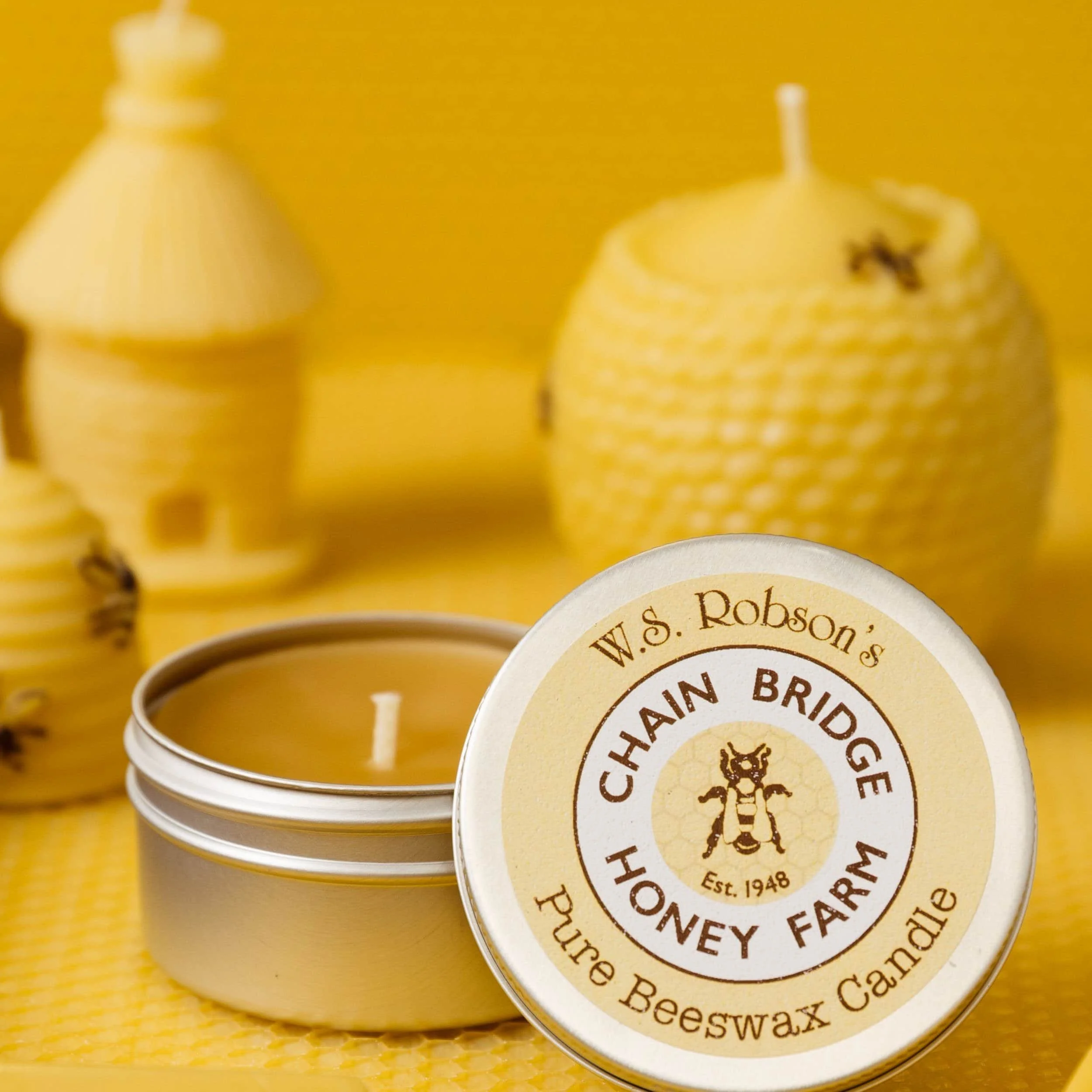 candles on yellow beeswax background