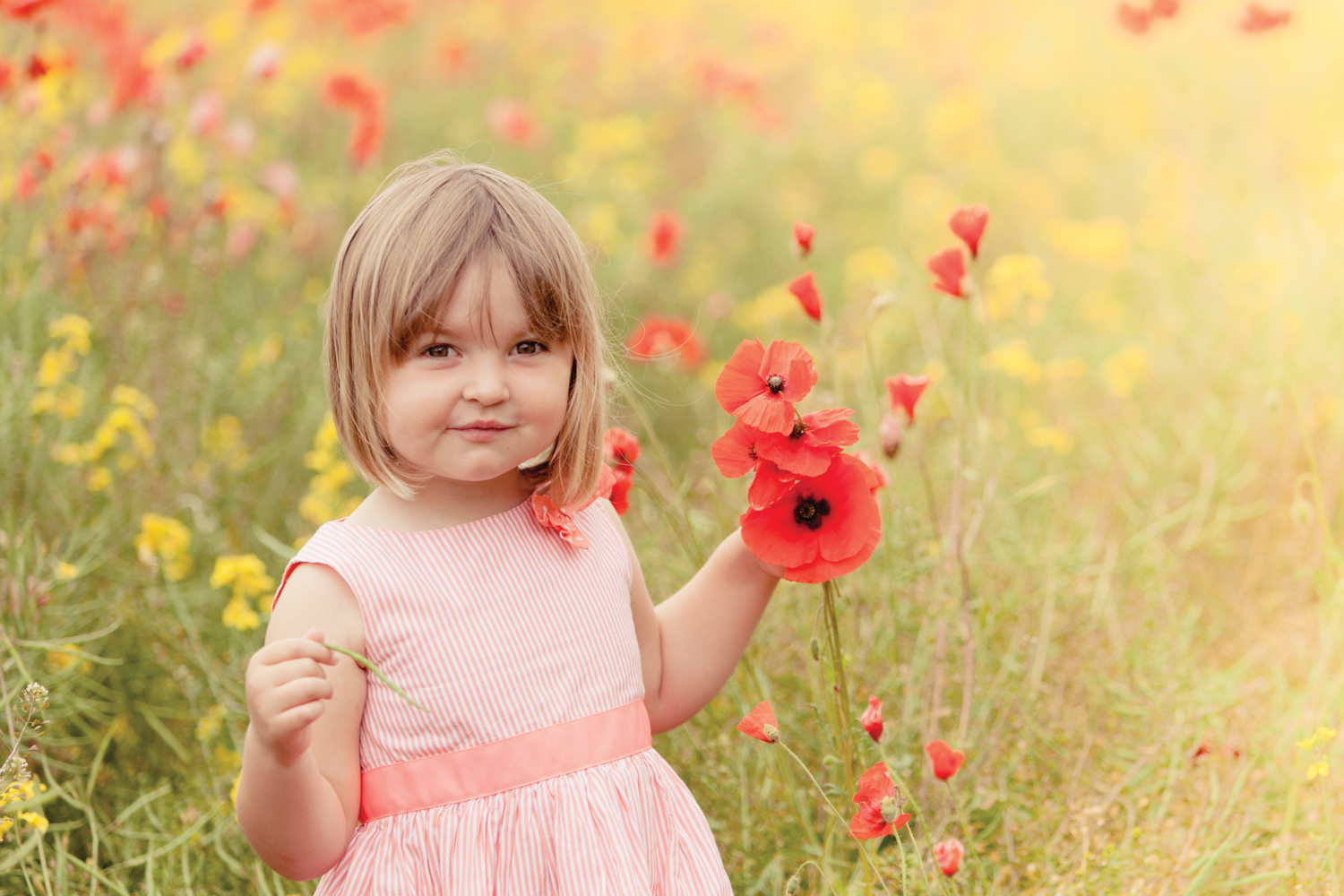 Girl in a poppy field