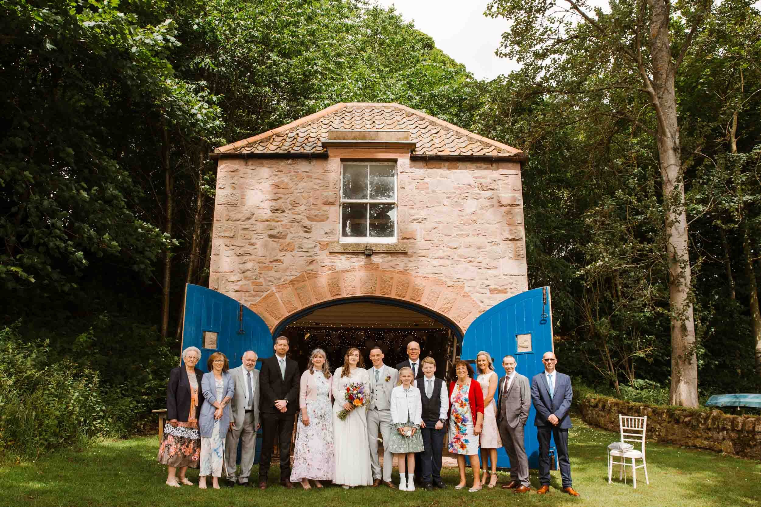 Casual but formal family wedding photograph outside Paxton Boathouse (Copy)