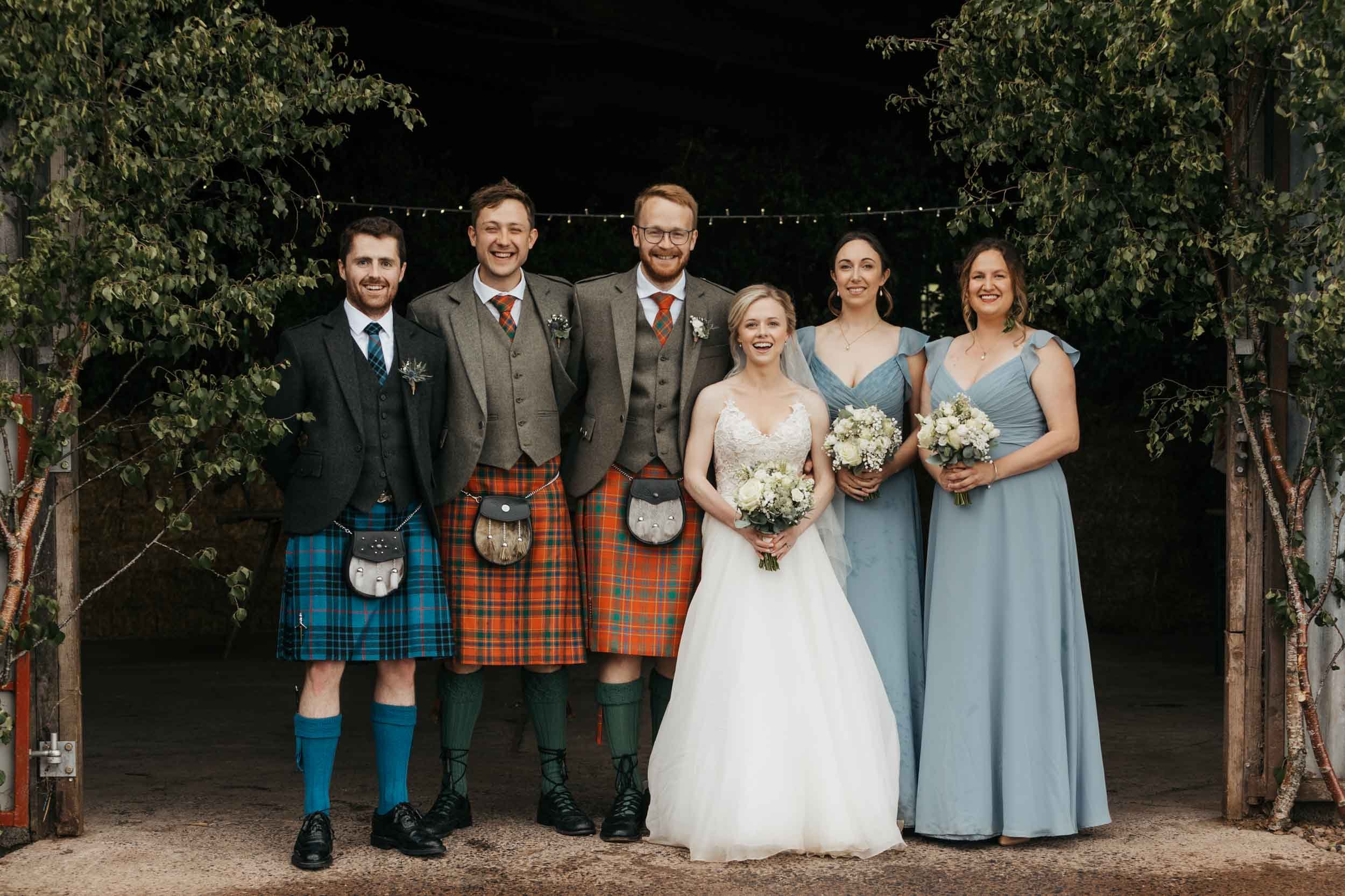 Wedding party formal photo in muted hues (Copy)