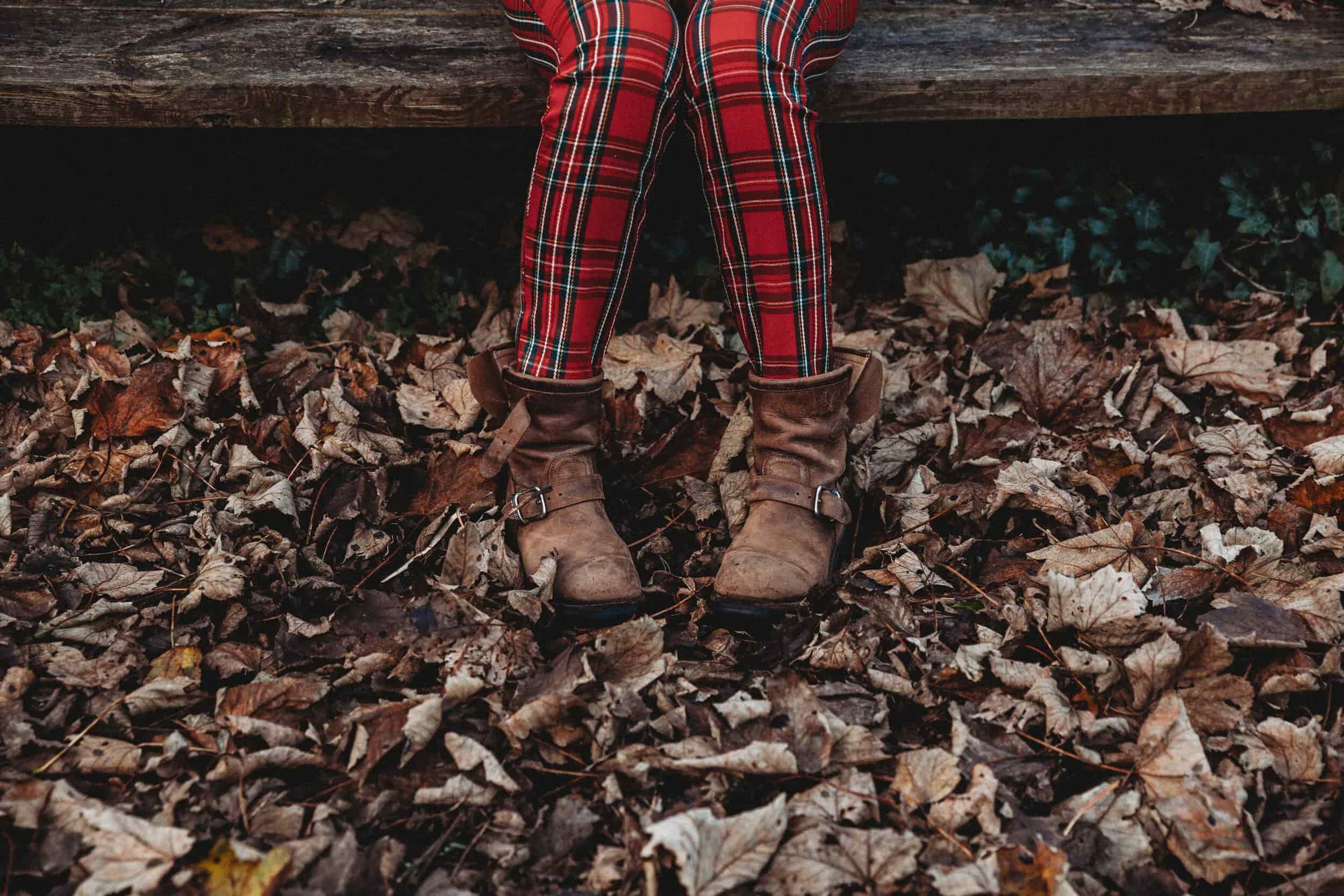 tartan red trousers and boots in the leaves