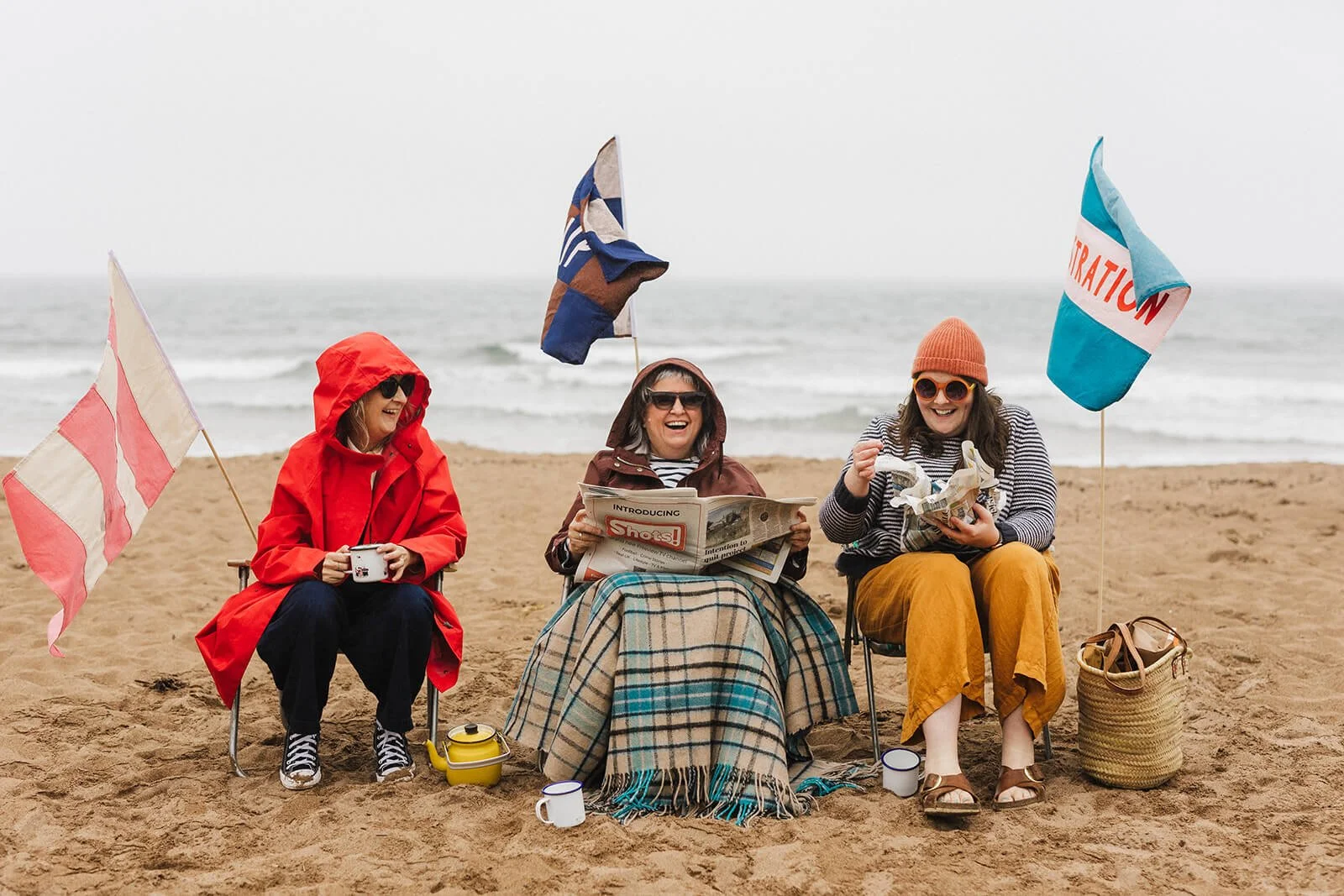 Creative brand photography session for illustrators on Coldingham Sands beach