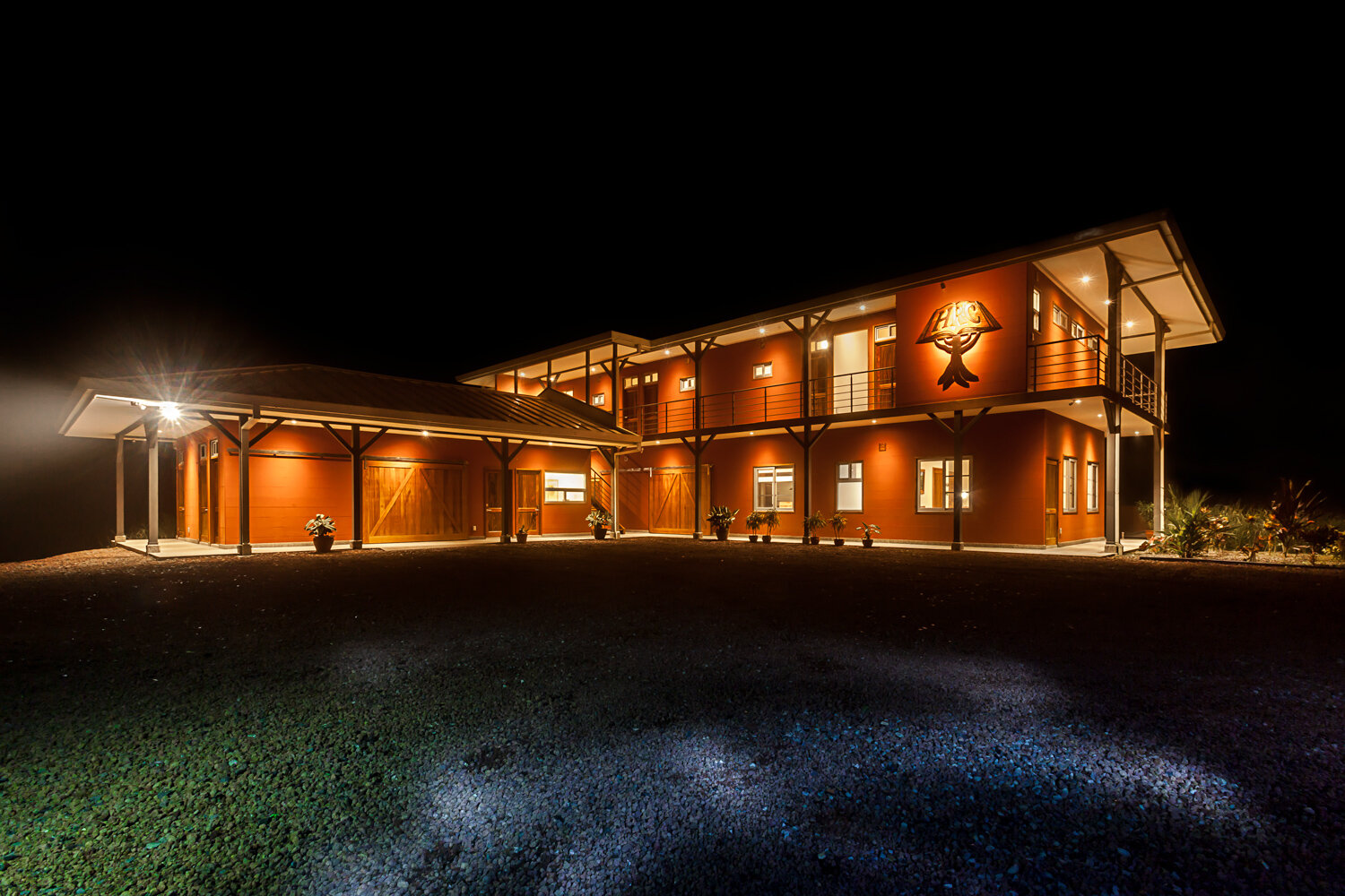 The courtyard and parking area at night