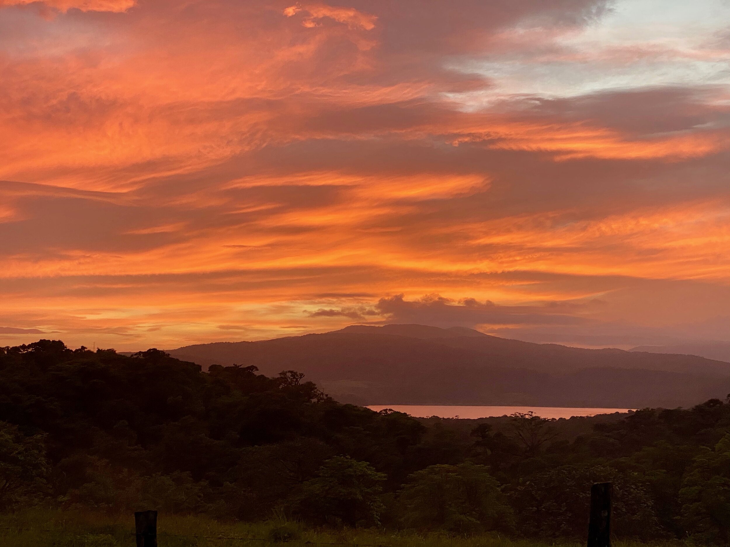 Volcano Arenal Sunset over Lake Coté. Watch out for UFOs!