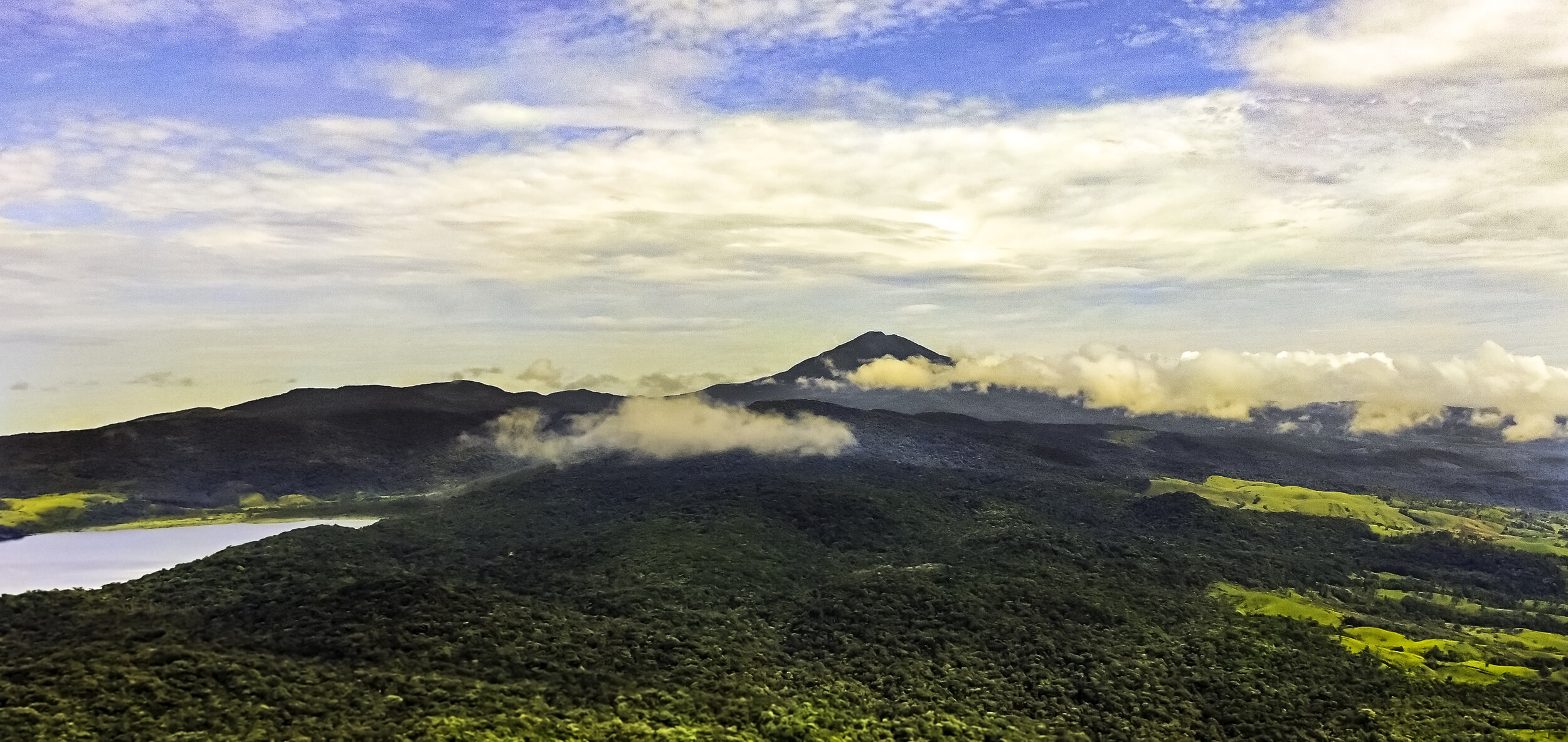 The view from 300 feet above the lodge, Lake Coté and Volcano Tenorio (Via Drone)