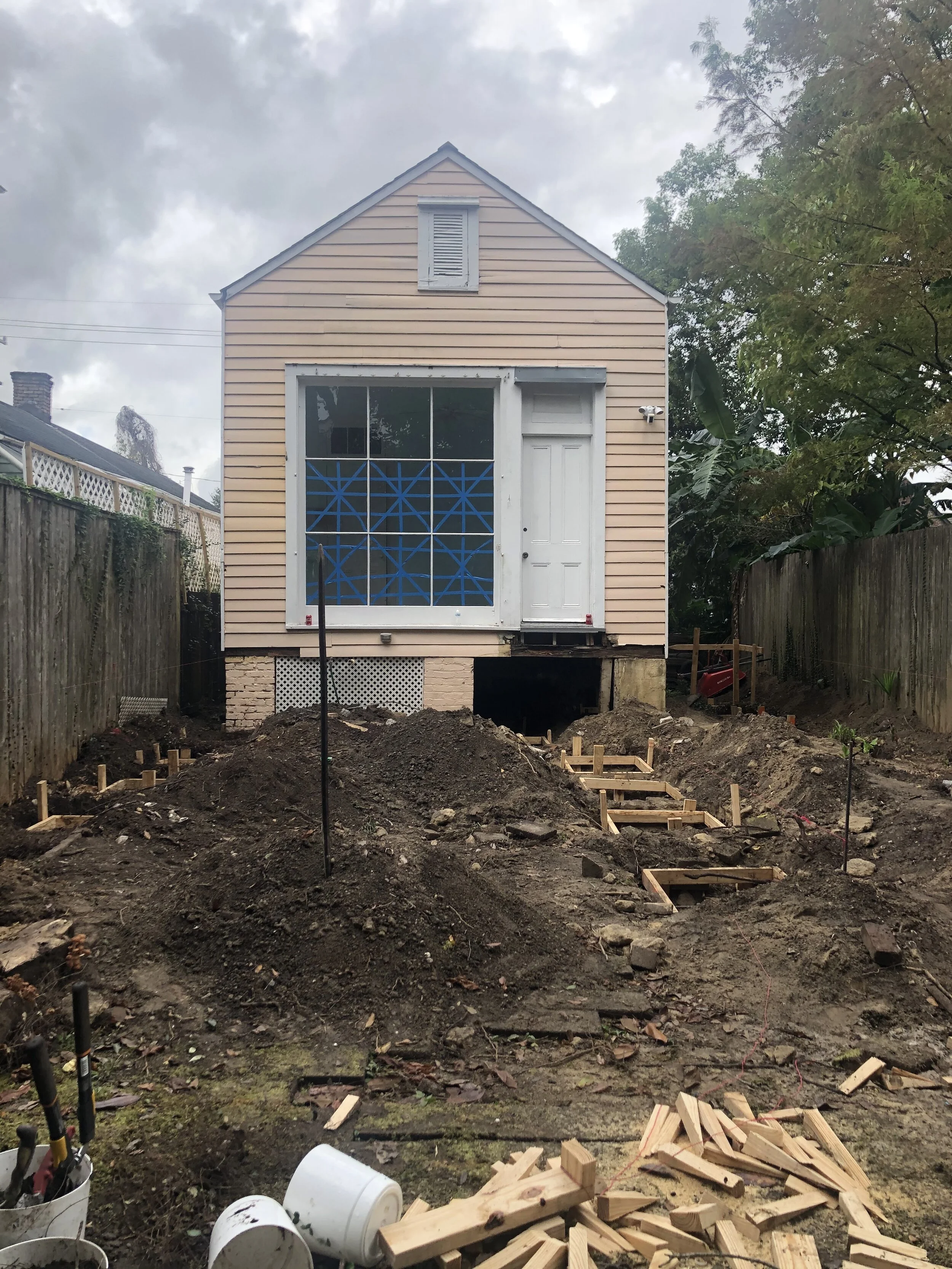 Rear yard view: we are removing this historic wood window sash at our camelback project on Camp Street.