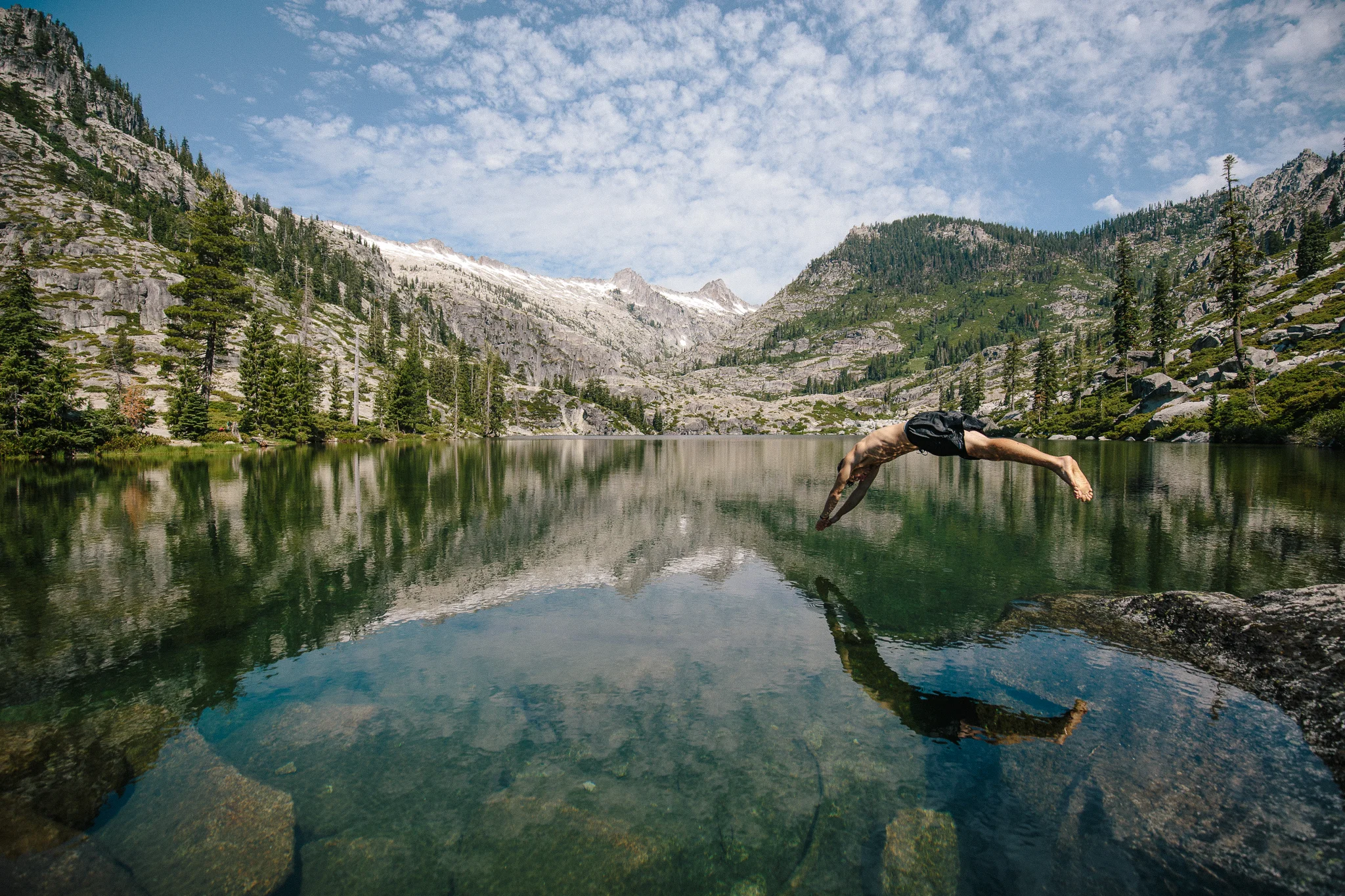 Cameron diving into the Canyon Creek lakes.