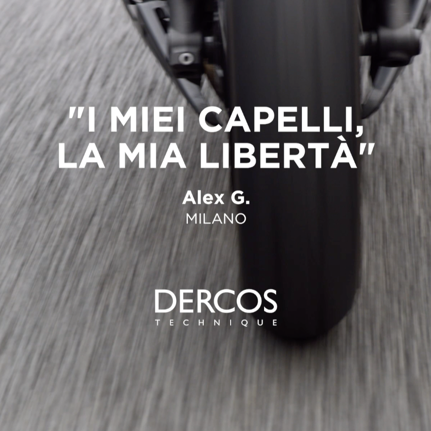 Close-up shot of a bicycle wheel in motion on a road with overlaid text in Italian and English, including a quote from Alex G. and references to Dercos Technique.