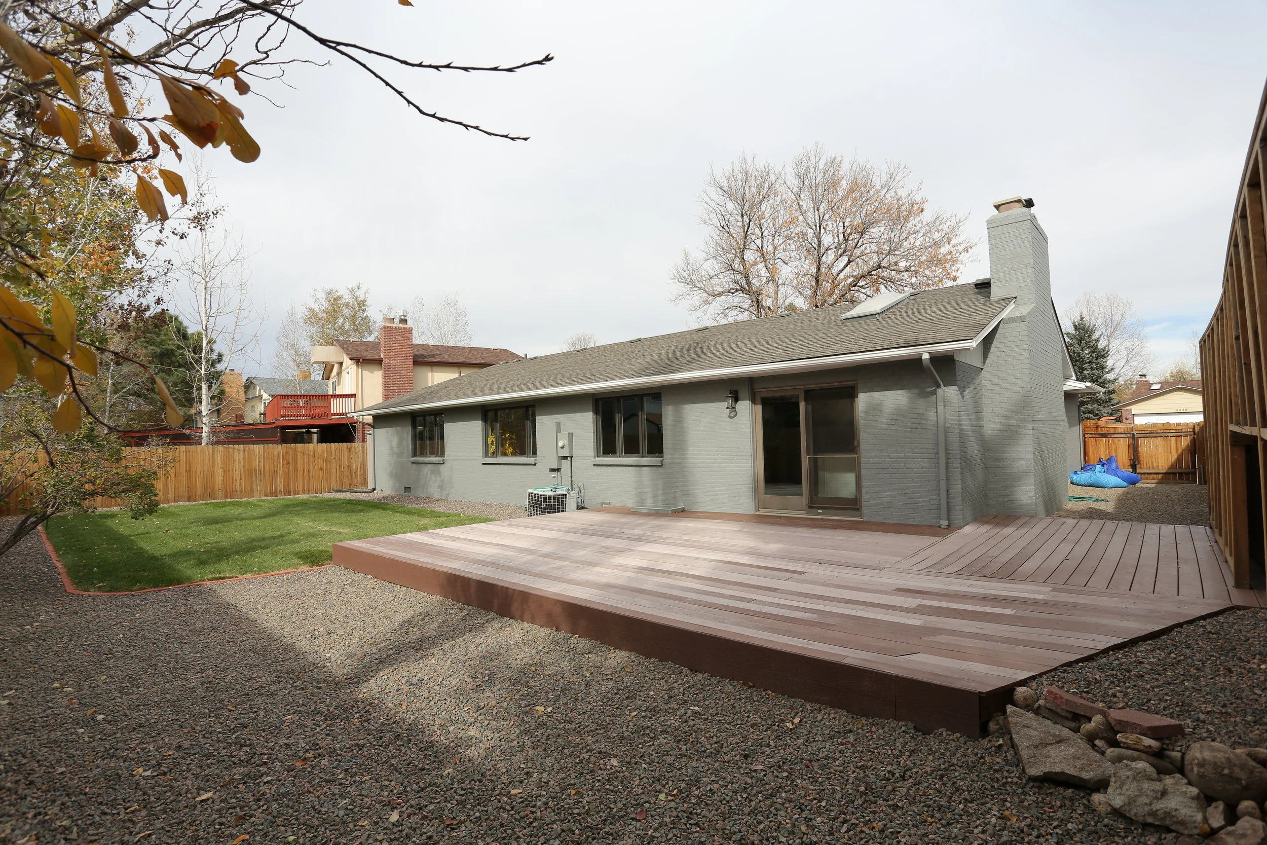 composite deck, great for an outdoor bbq or lounge space, rv storage, and new sod in yard