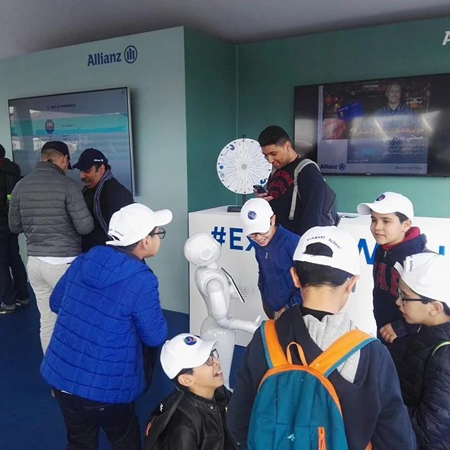 Champagne, fast cars and...robots? Pepper attending Formula E Marrakesh E-Prix 🏎 @fiaformulae #Motorsport #ElectricCar #ElectricRacing #PepperRobot