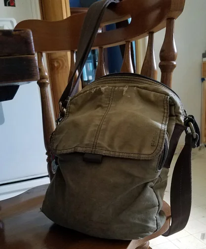 Messenger Bag standing tall in spite of the wear and tear