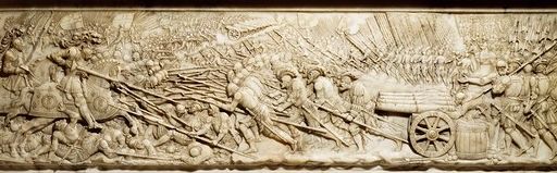 Relief of the Battle of Marignano on the side of the Tomb of Francis I in the Abbey Church, Saint-Denis, France. Francis is to the left on his horse wielding a lance. interesting enough, the enemy did not have cannons although this releif depicts Francis charging into cannons.