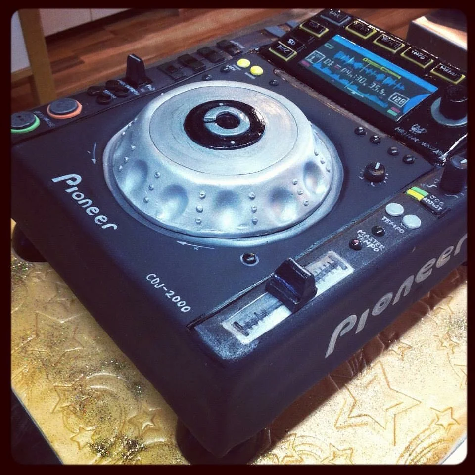 Pioneer Turn table cake.jpg
