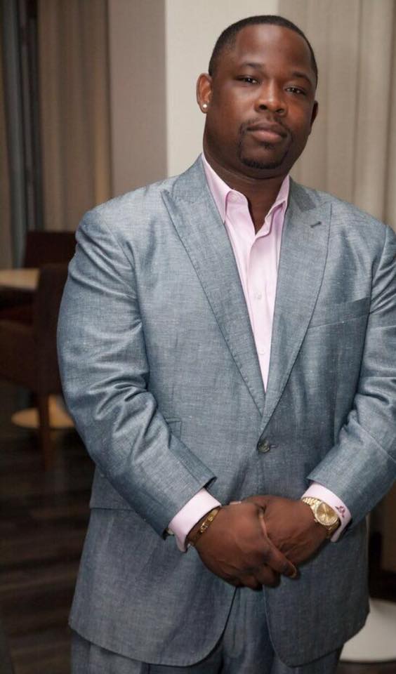 Carl A. Moore , Co-Owner