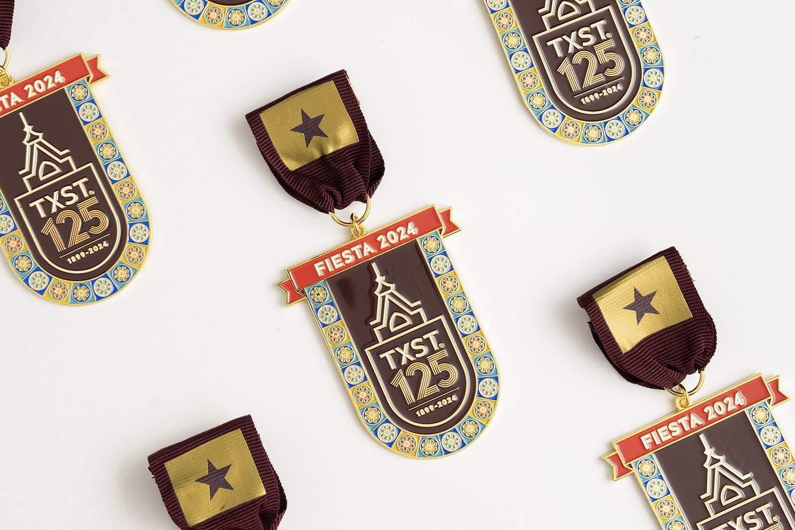 p24-112-125-Fiesta-Medal03Web.jpg