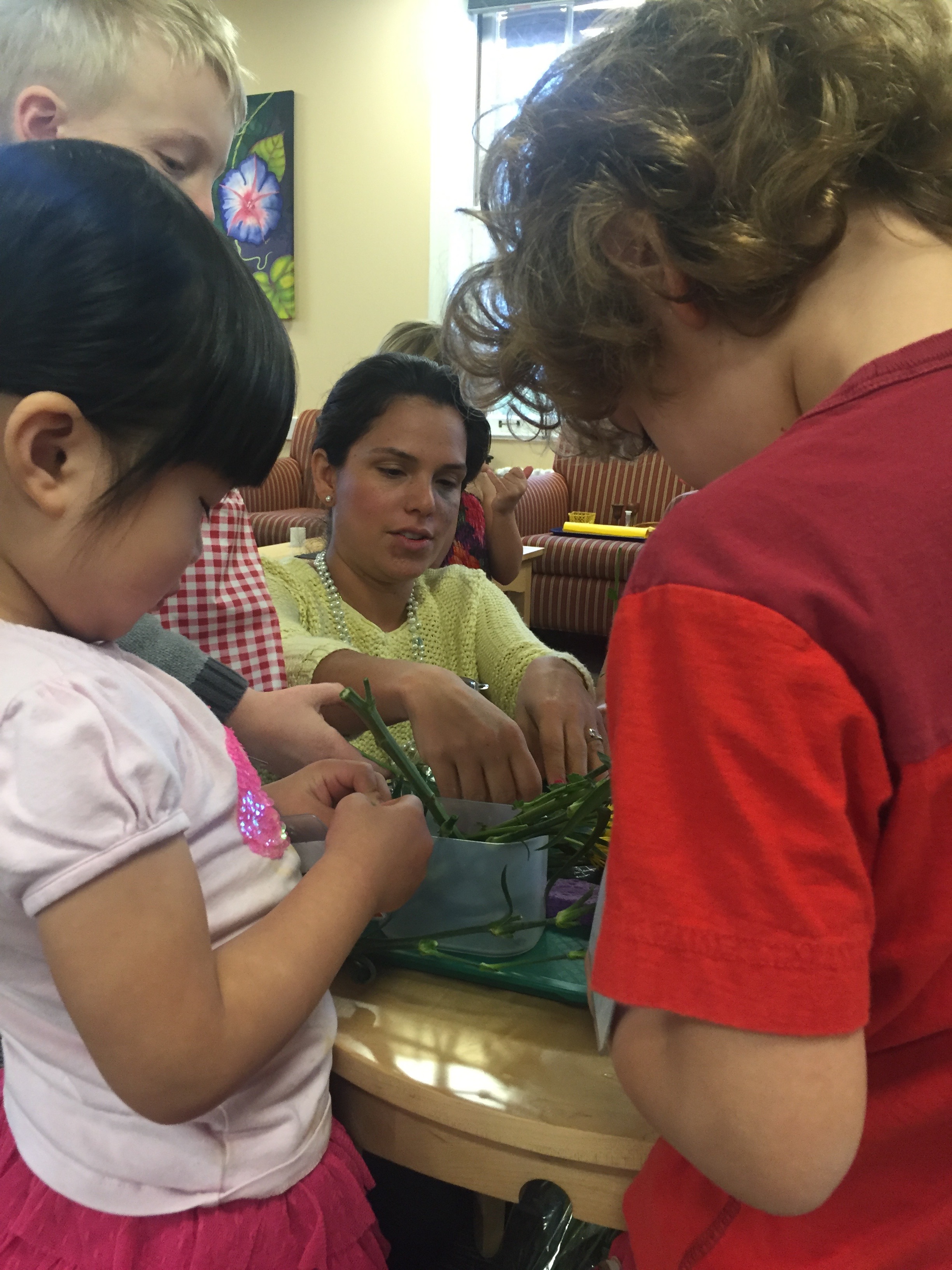 Catechist Emma, assists Level I children with learning through the CGS handson works, about the Mass parts, bible stories and their relationship with Jesus.