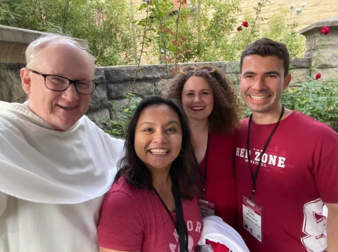 Fr. Bart catching up with alumni during Alumni Homecoming weekend
