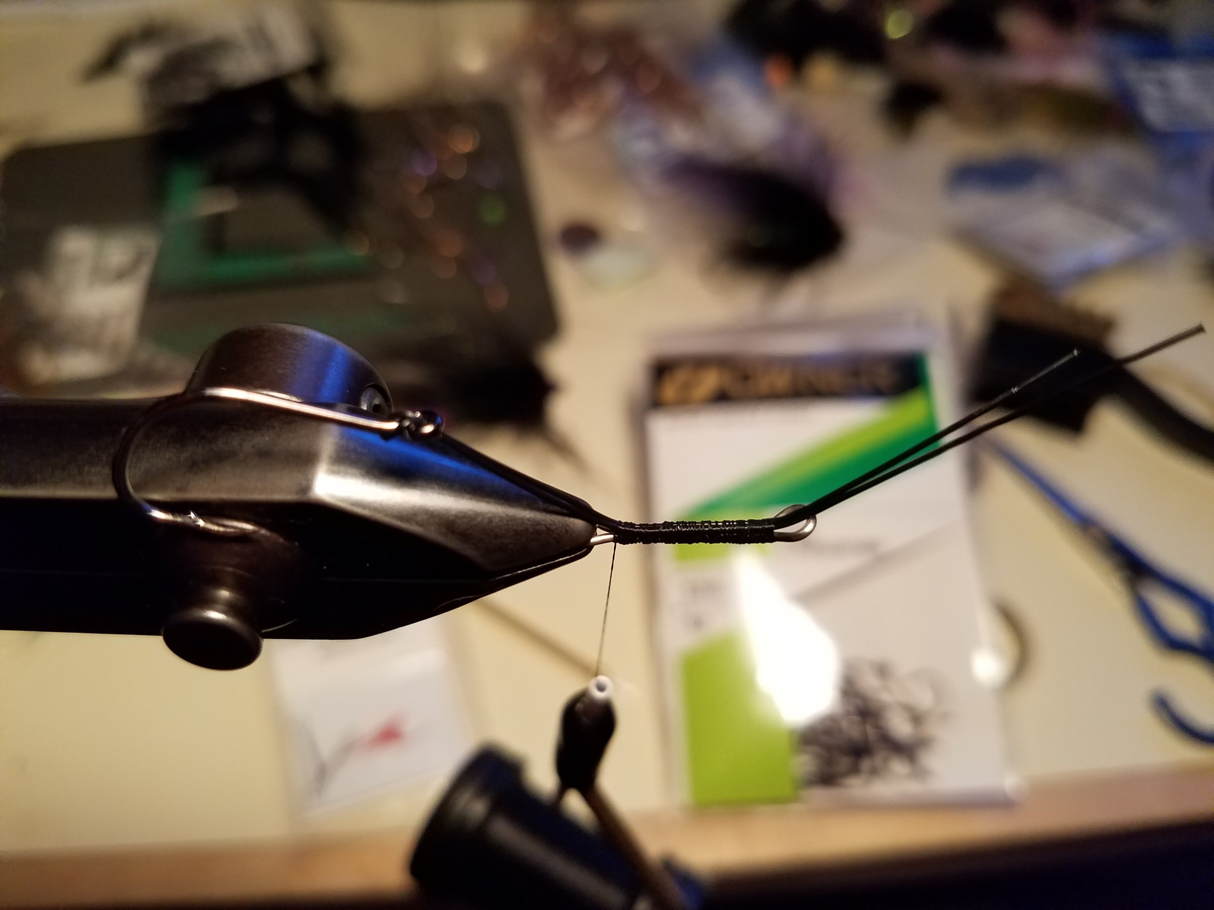 TYING IN SENYO INTRUDER WIRE AND STINGER HOOK. HOOK POINT DOWN.