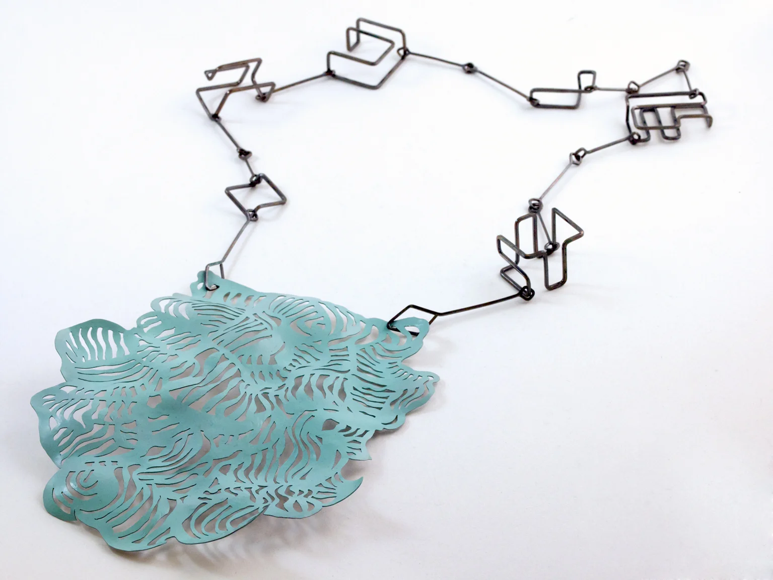 The Passage of Time. 2013 Pendant. 2016 Aluminum, lacquer, silver.
