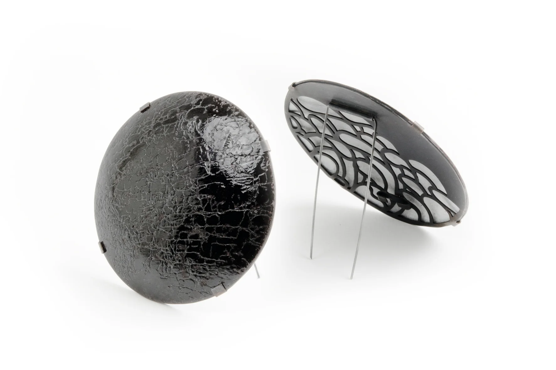 Icarus, 2018 Enamel, silver leaf, copper, steel wire. (Front and back) Brooch.