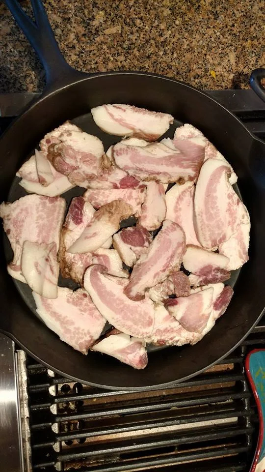 Arrange on a cold skillet off the heat, it's always important to start cold meat on a room-temp pan.