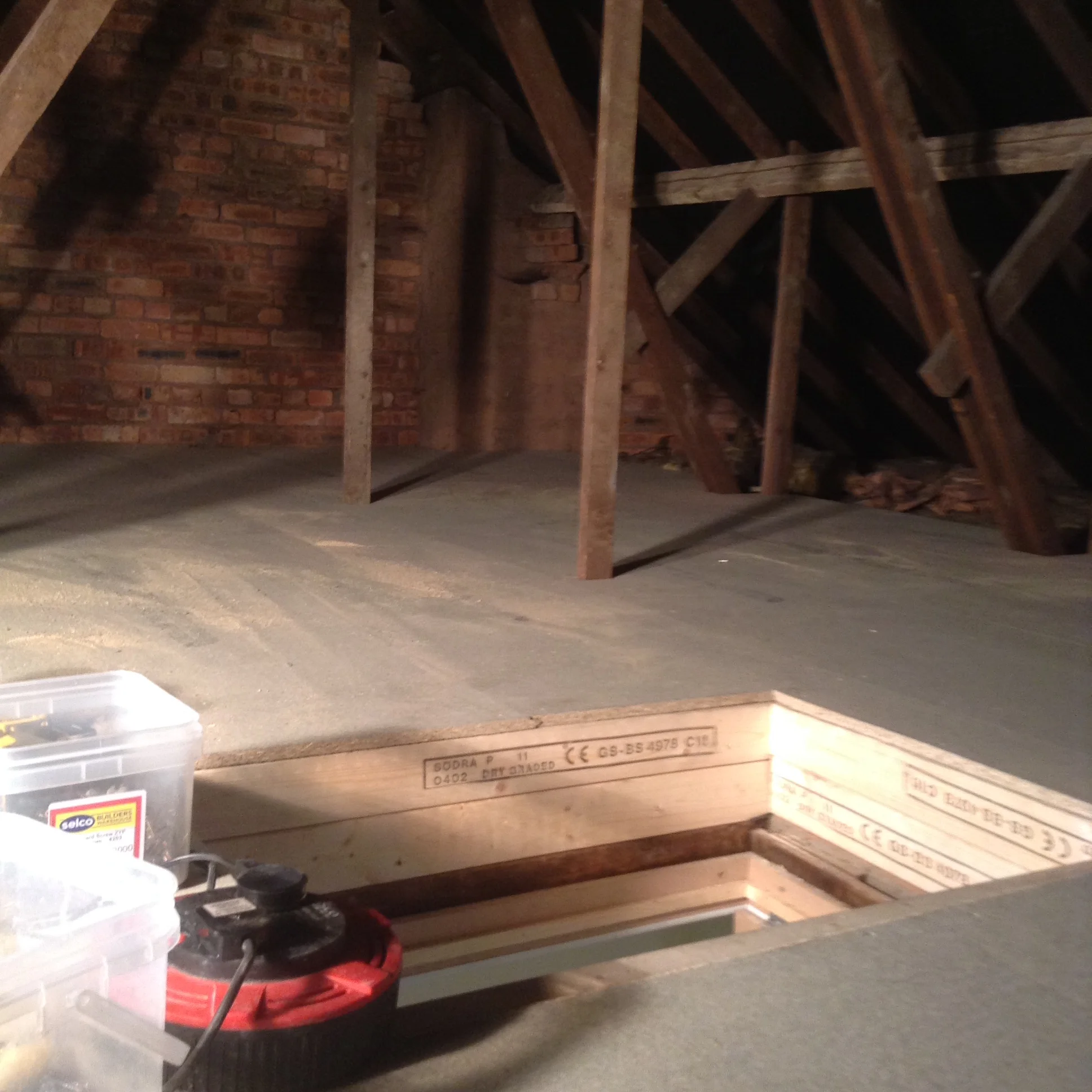 Empire Lofts — Installing Loft Boarding Over Pipes in Warwick