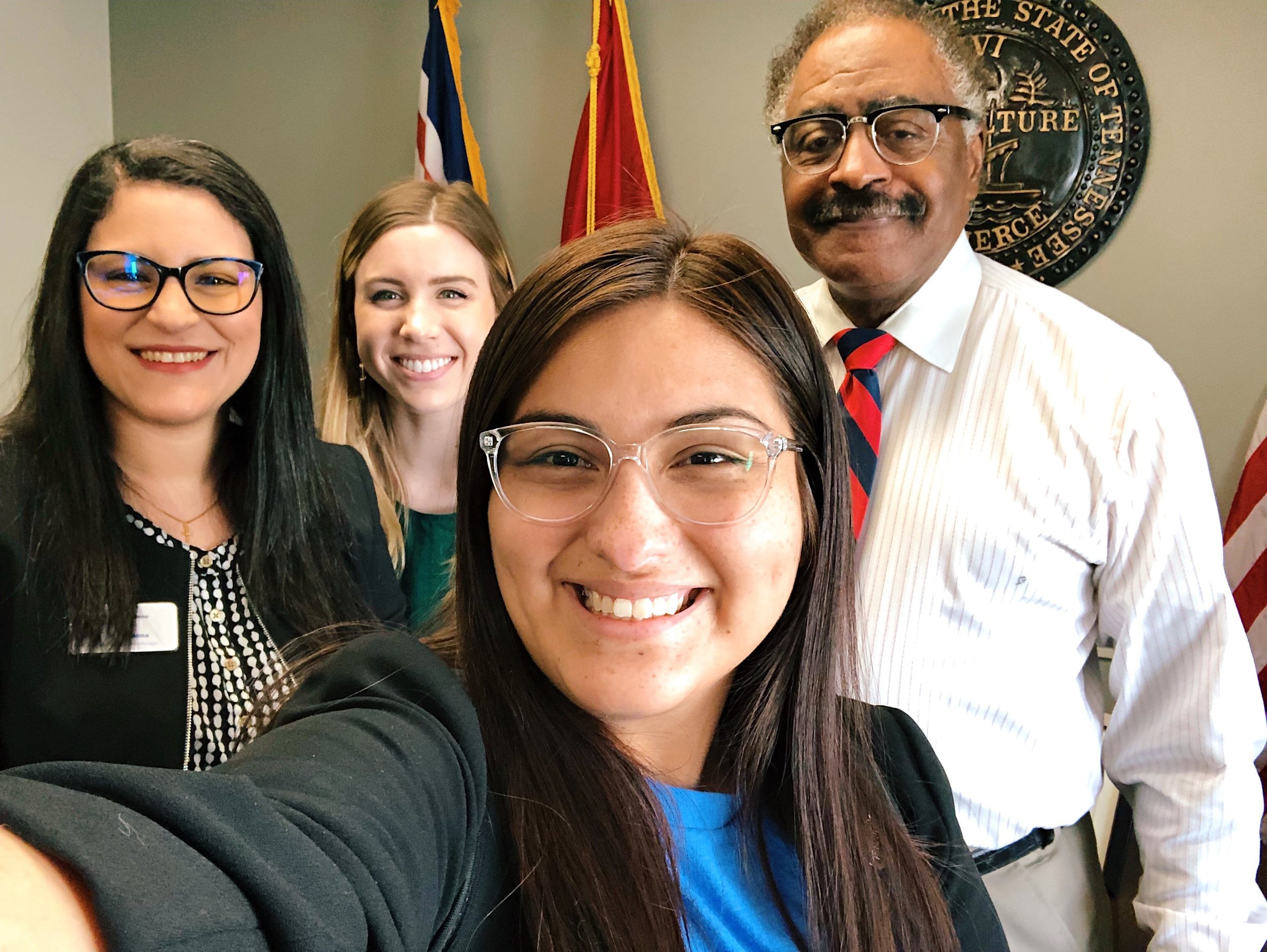 Parent Leadership Team members and PCAT staff with Representative John DeBarry, Jr. after a meeting to discuss the importance of home visiting services for families in Tennessee.