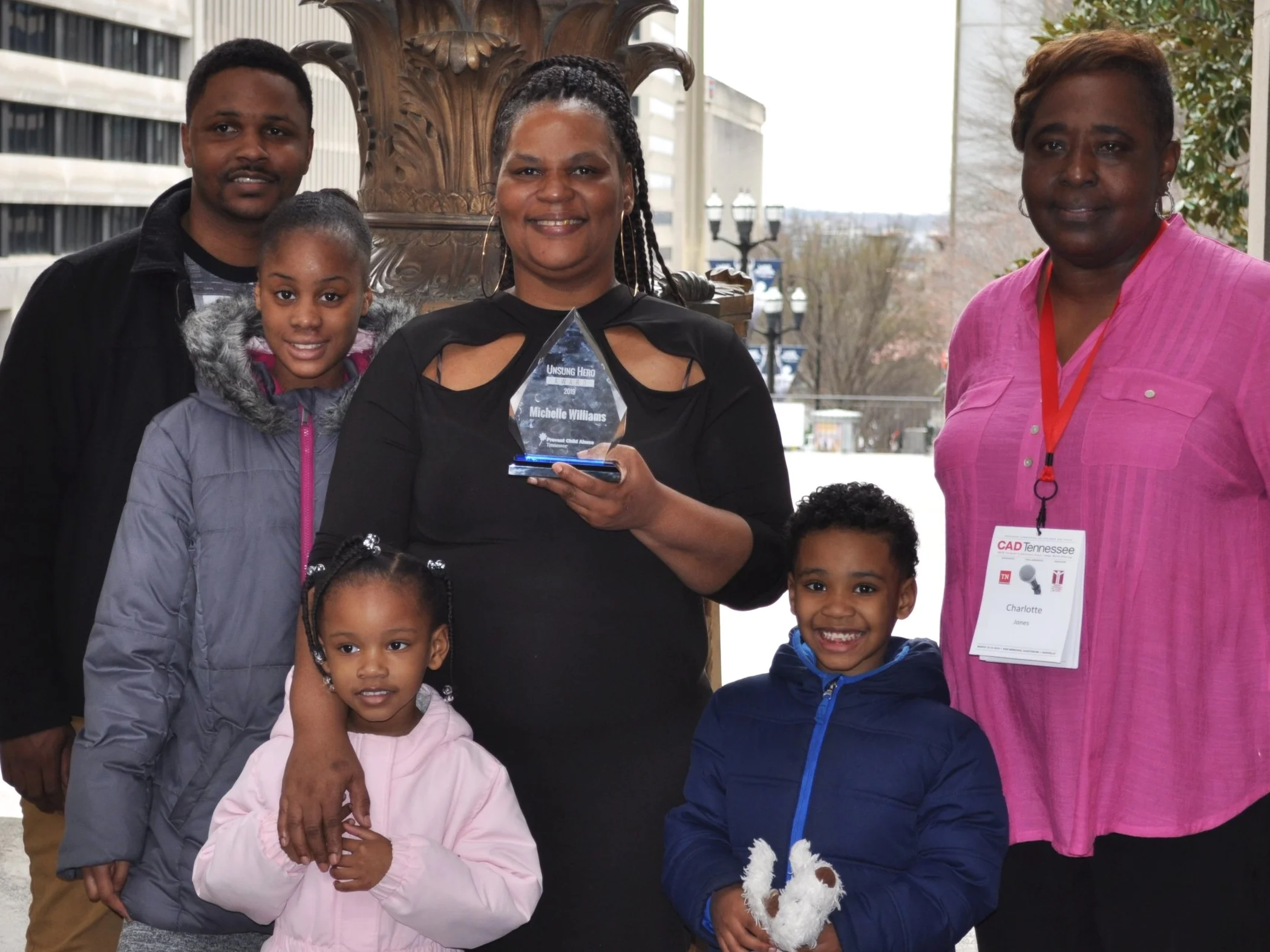 Michelle+Williams+with+her+family+and+a+representative+from+the+Memphis+Child+Advocacy+Center.jpg