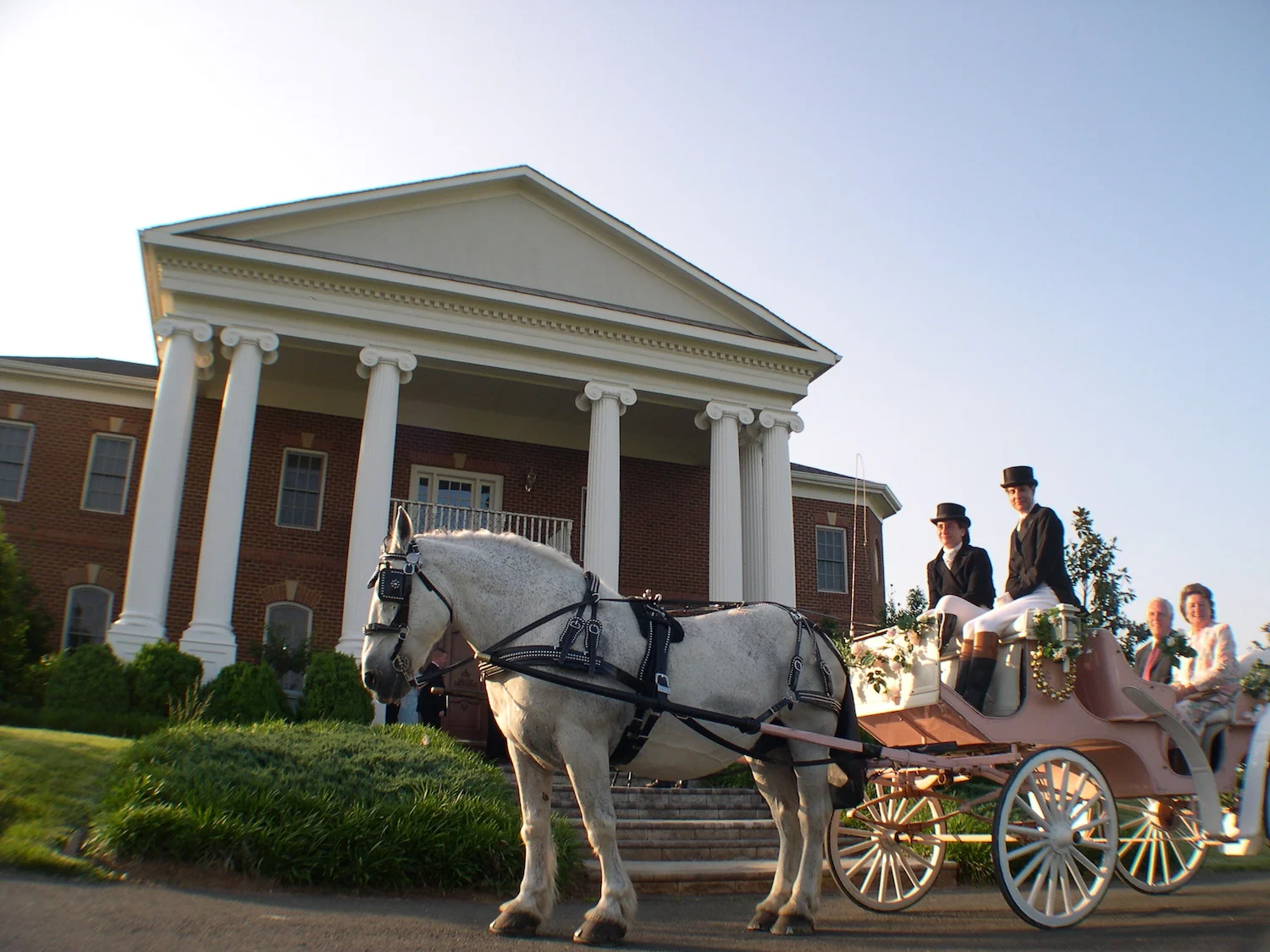 front-facade-with-horse-carriage.JPG