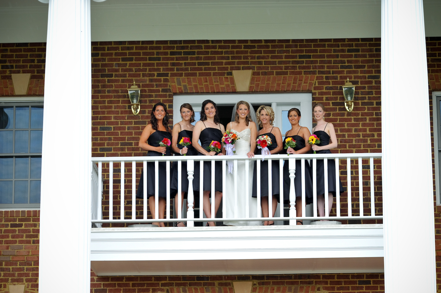 front-rose-hill-bridal-party-on-balcony.jpg