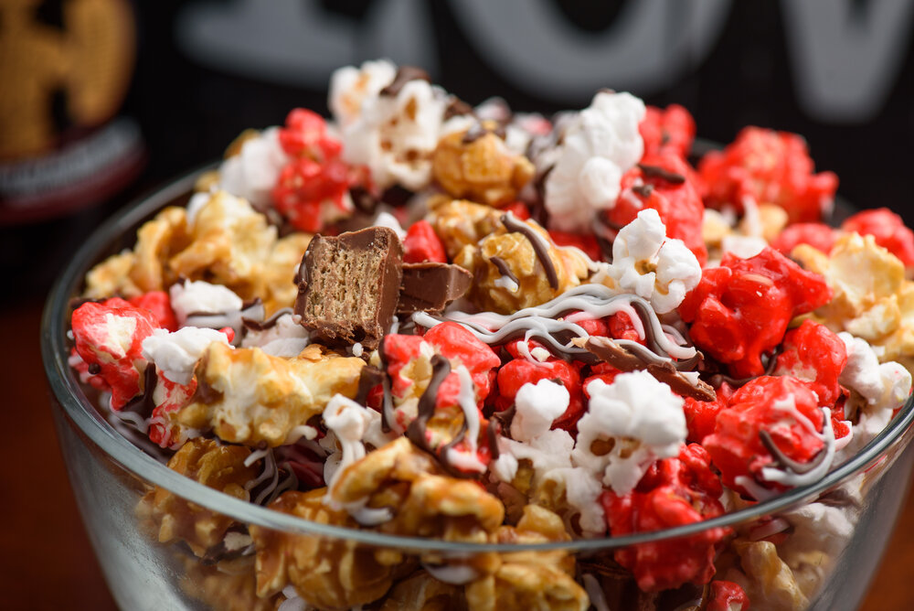 Kit Kat Attack - A Medley Caramel, White Confetti Popcorn Drizzled with White Chocolate and Milk Chocolate then Layered with Kit Kat Pieces — Simply A-Maize-N Popcorn & Snacks