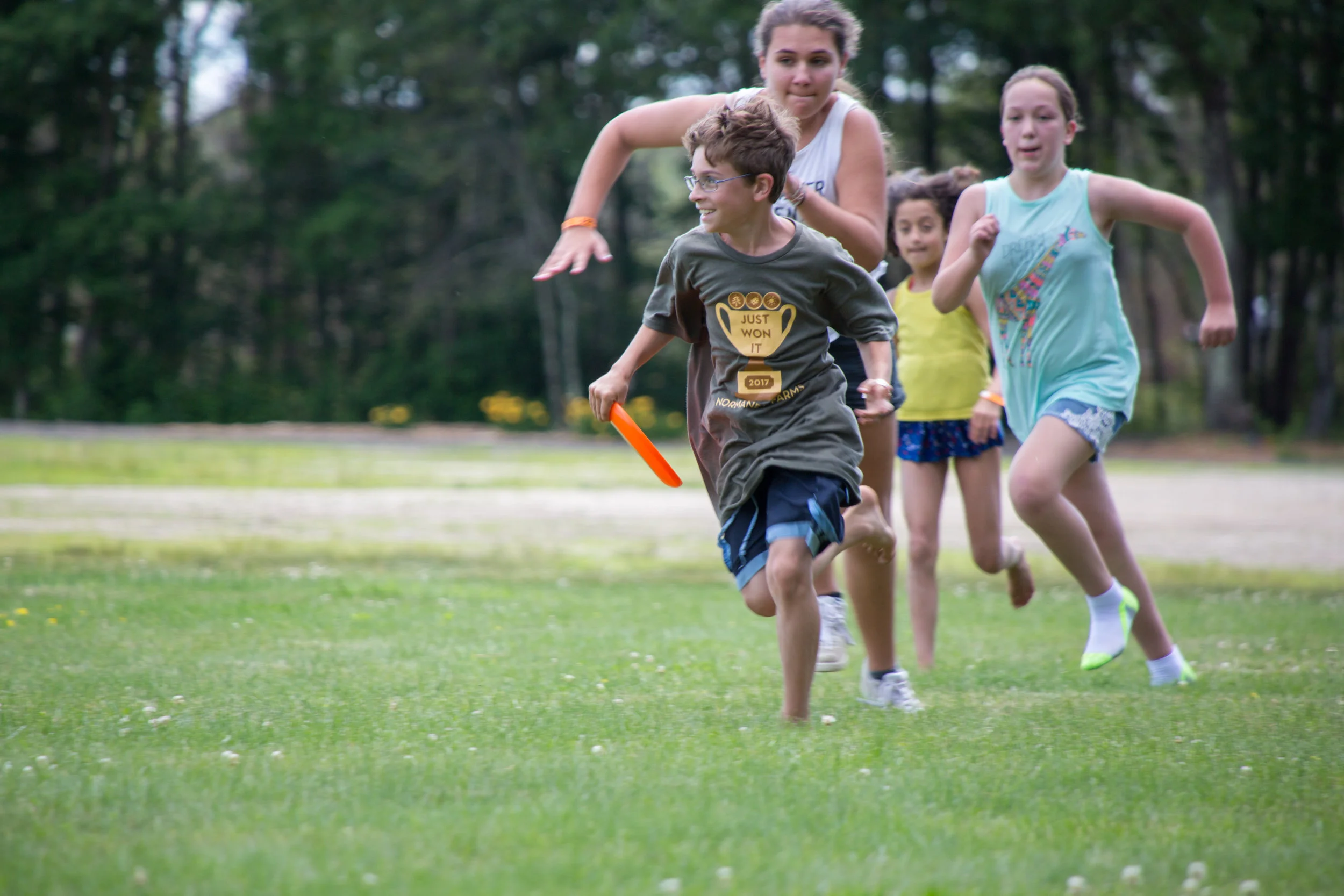Playing capture the flag at Normandy Farms Campground in Foxborough, Mass.
